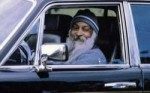 Osho-driving-Rolls-Royce.jpg