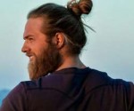 A-hipster-with-a-shaggy-beard-and-a-full-man-bun-hair-style.jpg