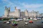 1280px-CaernarfonCastle1994