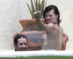 2011milla-jovovich-topless3fadedyouthblog.jpg