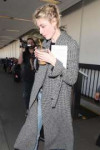 elizabeth-debicki-arriving-on-a-flight-at-lax-11-14-2018-4.jpg