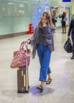 sienna-miller-at-heathrow-airport-in-london-5.jpg