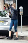 elizabeth-olsen-wears-a-navy-sweatshirt-and-blue-leggings-f[...].jpg