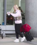 elle-fanning-at-airport-in-toronto-08-05-2019-2.jpg