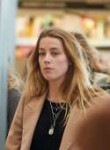 amber-heard-heathrow-airport-in-london-march-2015-09.jpg