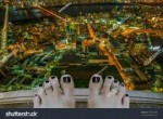 stock-photo-barefoot-woman-on-top-of-a-building-thinking-of[...].jpg