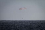 2015.02.10CRS-5Dragonunderparachute(16641912477).jpg