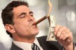 Businessman-lighting-cigar-with-100-dollar-bill.jpg